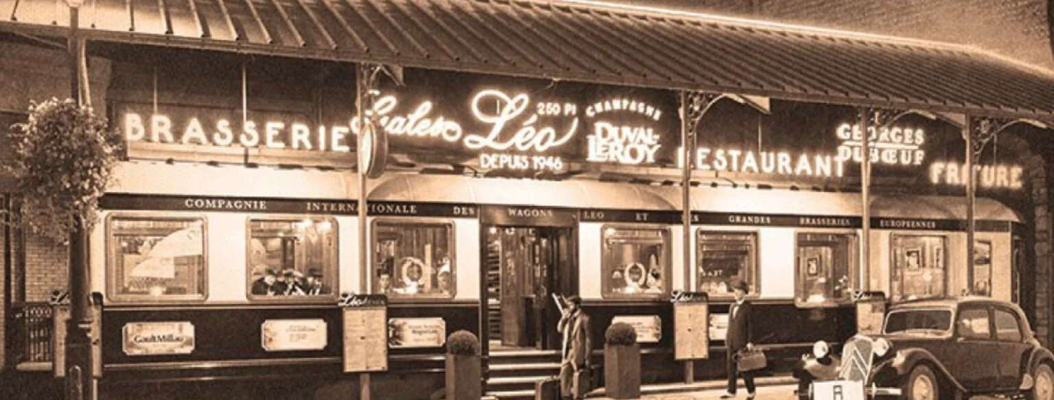 Ancienne photographie de la façade du Wagon Léo à Bastogne